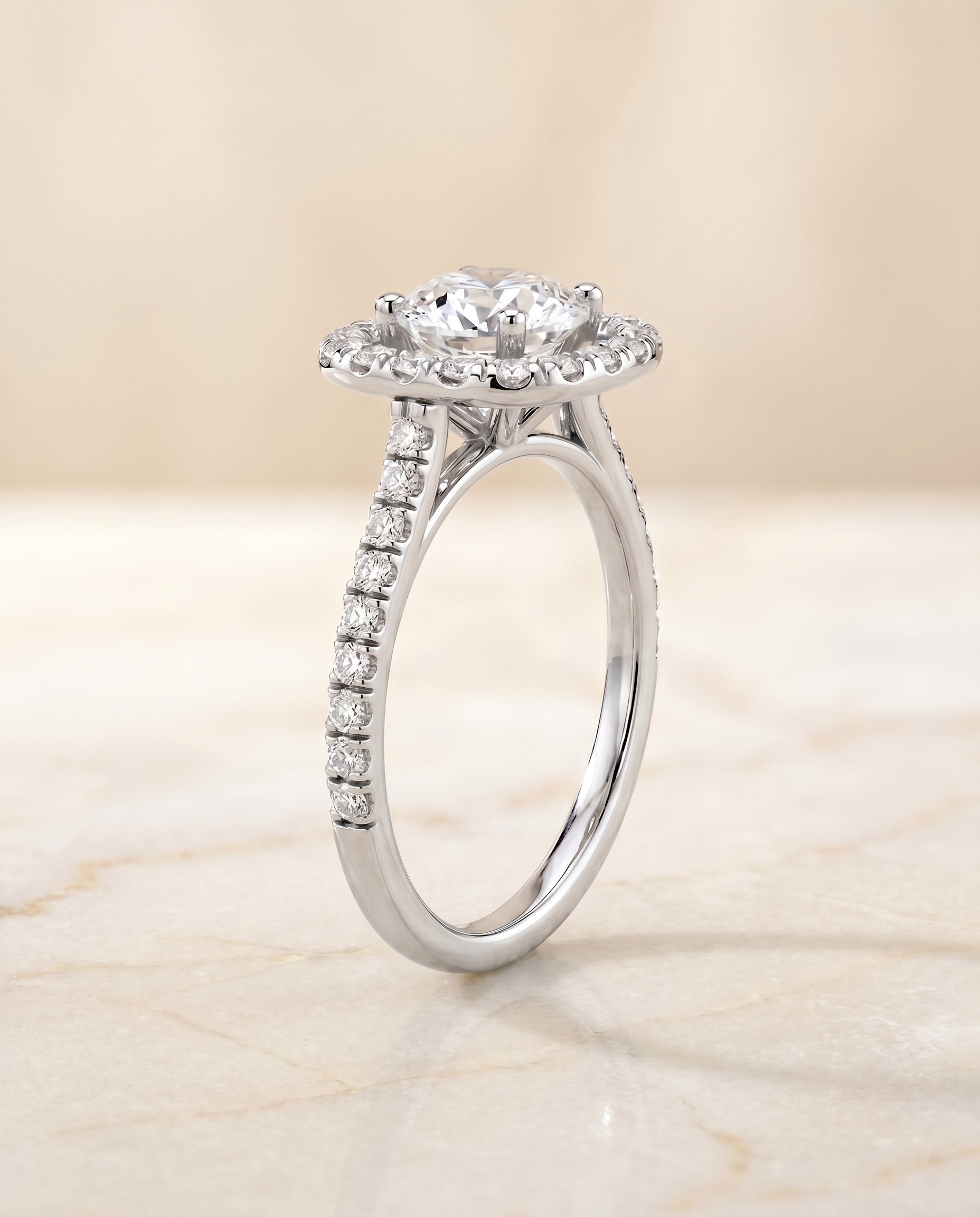 French Pavé Halo Frame styling on The Hymn round engagement ring setting | RockHer
