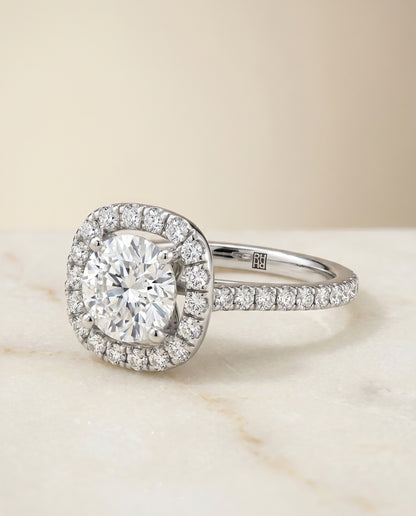 The Hymn French Pavé Halo Frame Round Engagement Ring Setting in Platinum