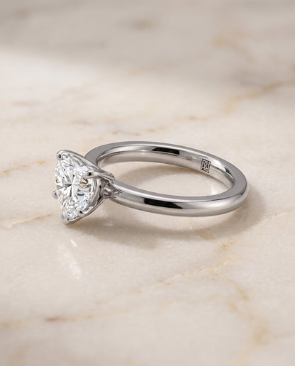 The Isolde Petite Knife Edge Solitaire Heart Engagement Ring Setting in Platinum