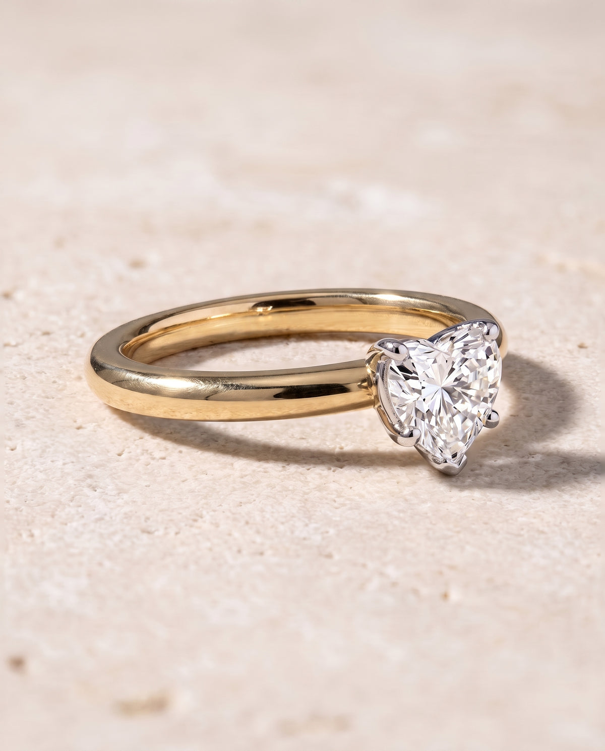 The Isolde Petite Knife Edge Solitaire Heart Engagement Ring Setting in 18K Yellow Gold