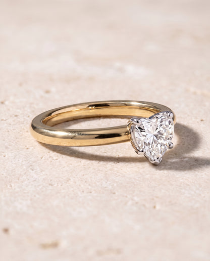 The Isolde Petite Knife Edge Solitaire Heart Engagement Ring Setting in 18K Yellow Gold