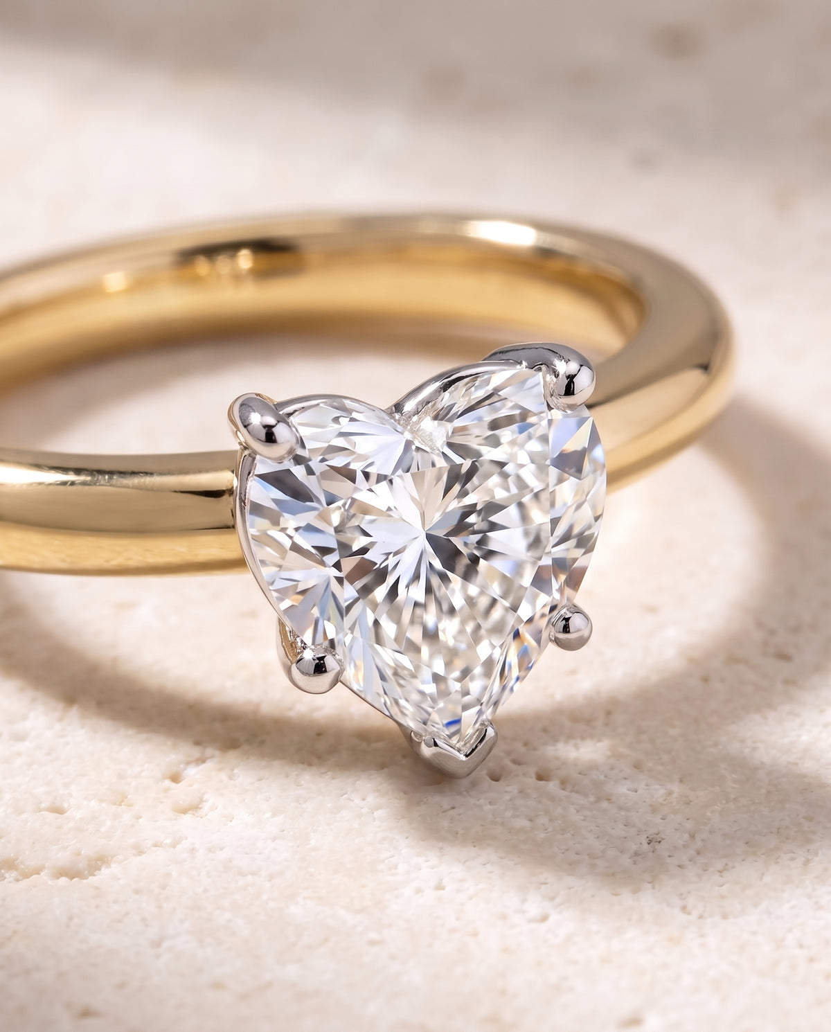 The Isolde Petite Knife Edge Solitaire Heart Engagement Ring Setting in 18K Yellow Gold