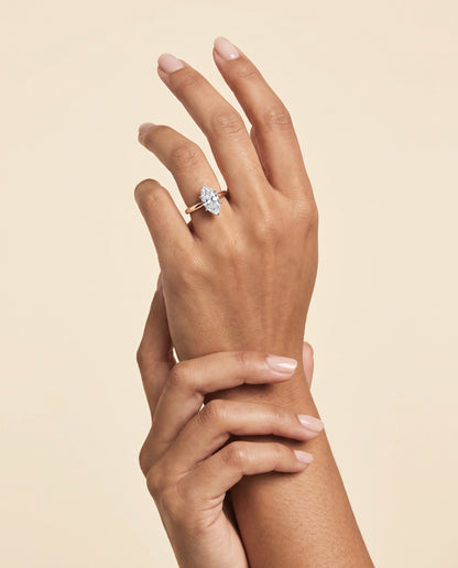 The Isolde Petite Knife Edge Solitaire Marquise Engagement Ring Setting in 14K Rose Gold