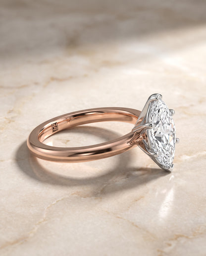 The Isolde Petite Knife Edge Solitaire Marquise Engagement Ring Setting in 14K Rose Gold