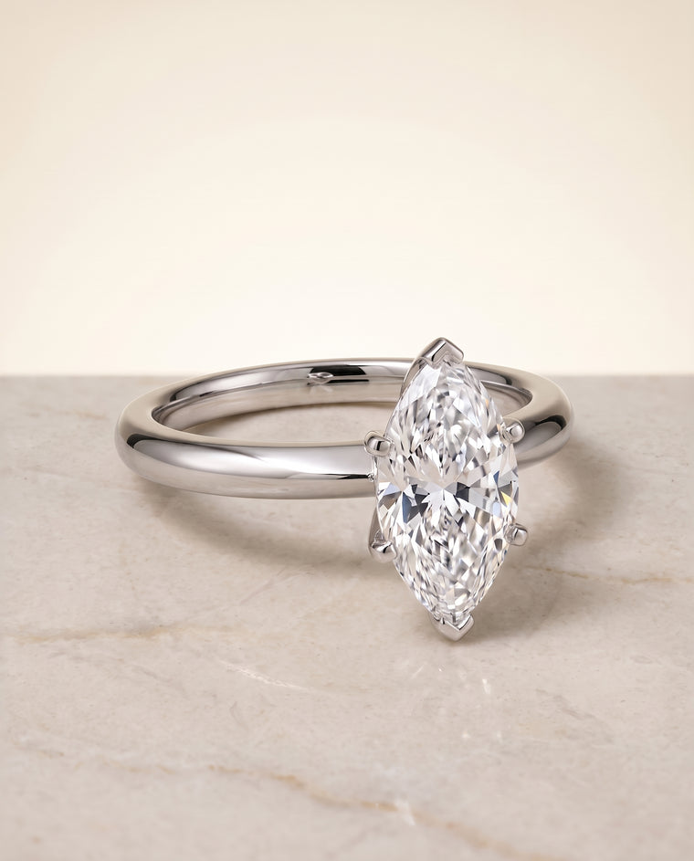 The Isolde Petite Knife Edge Solitaire Marquise Engagement Ring Setting in 18K White Gold
