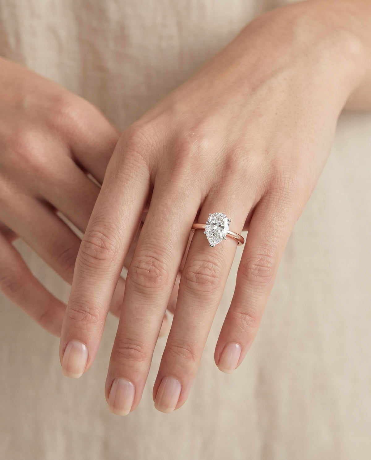 The Isolde Petite Knife Edge Solitaire Pear Engagement Ring Setting in 14K Rose Gold