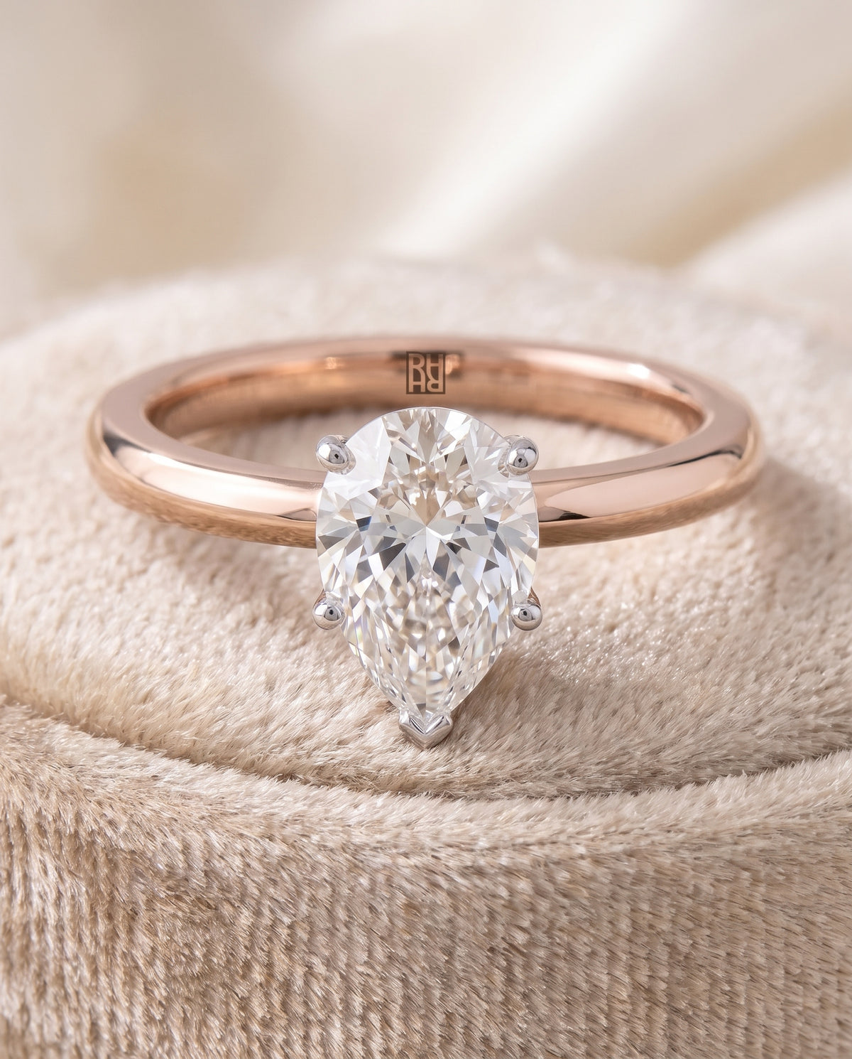 The Isolde Petite Knife Edge Solitaire Pear Engagement Ring Setting in 14K Rose Gold