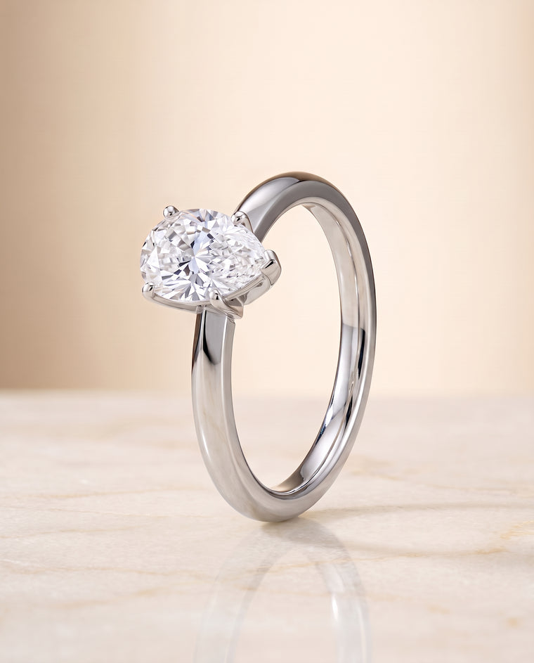 The Isolde Petite Knife Edge Solitaire Pear Engagement Ring Setting in Platinum