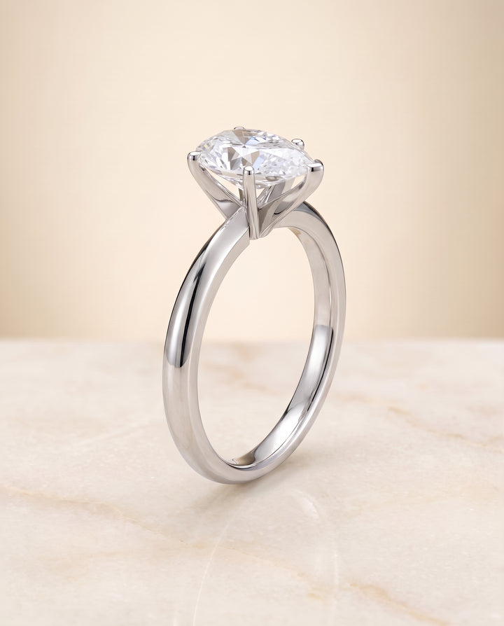 The Isolde Petite Knife Edge Solitaire Pear Engagement Ring Setting in Platinum