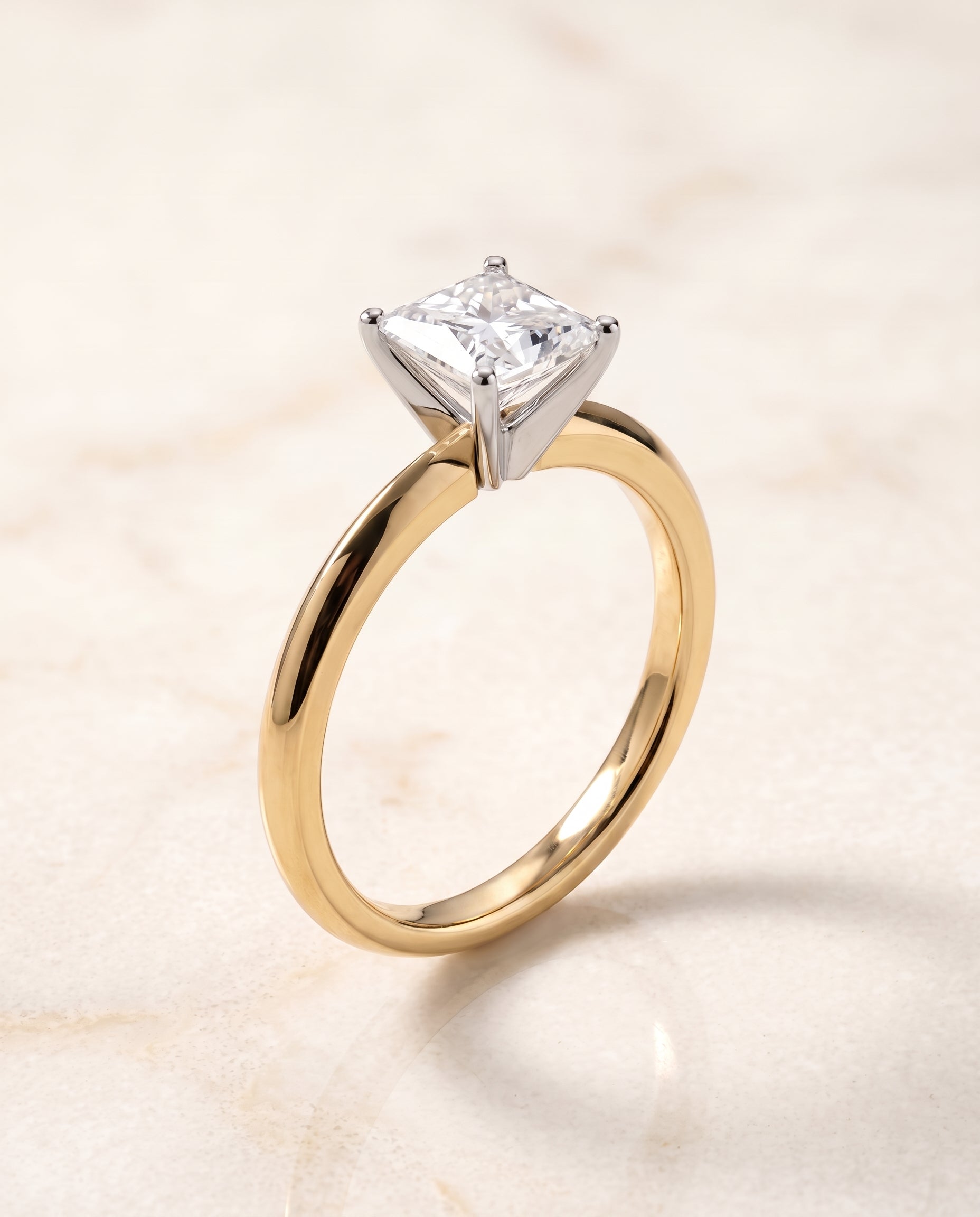 The Isolde Petite Knife Edge Solitaire Princess Cut Engagement Ring Setting in 18K Yellow Gold