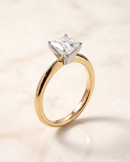 The Isolde Petite Knife Edge Solitaire Princess Cut Engagement Ring Setting in 18K Yellow Gold