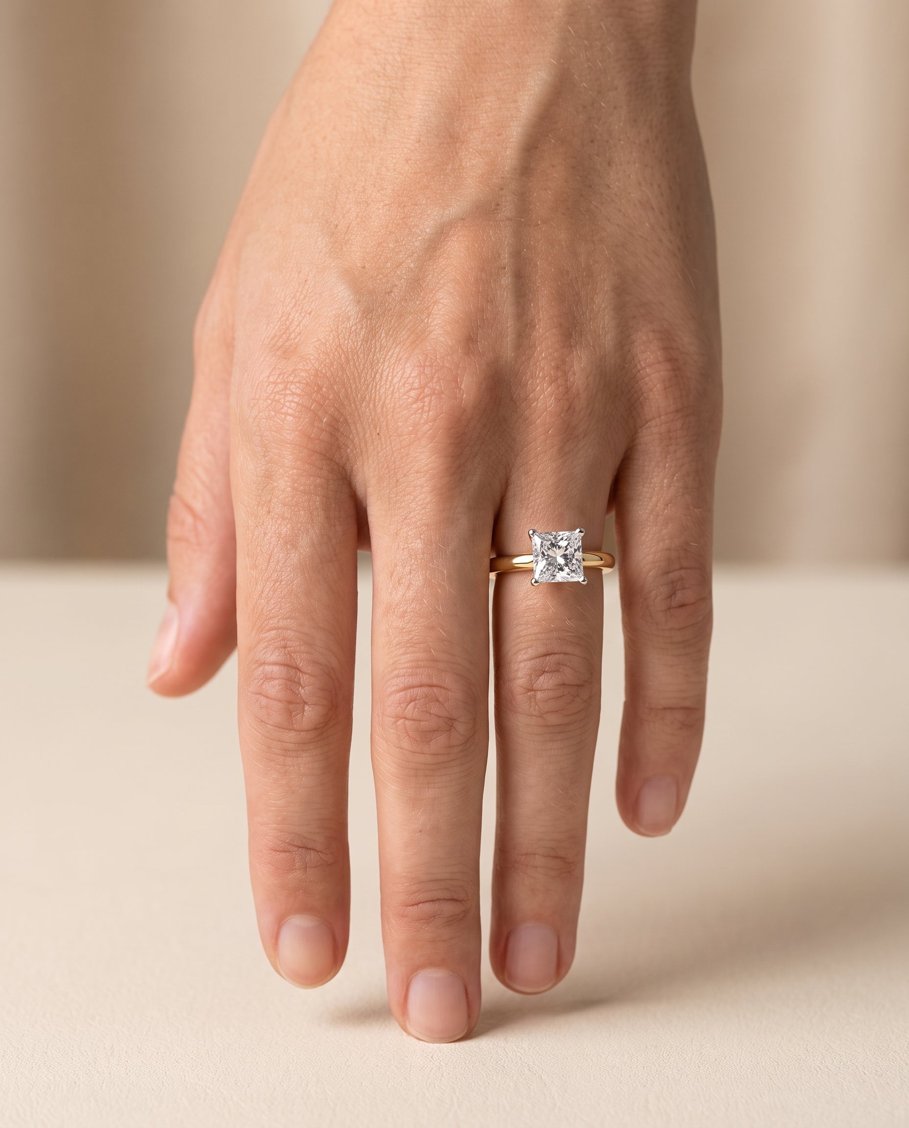 The Isolde Petite Knife Edge Solitaire Princess Cut Engagement Ring Setting in 18K Yellow Gold
