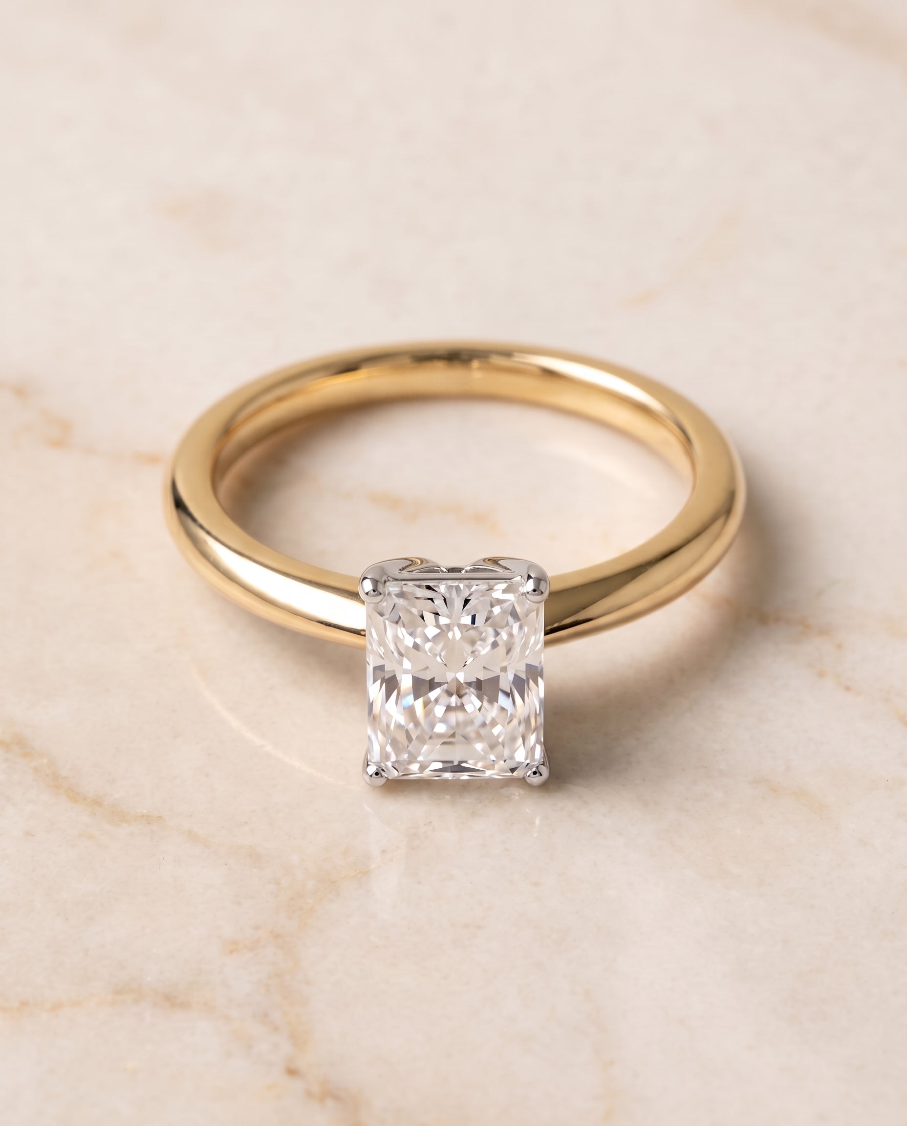 The Isolde Petite Knife Edge Solitaire Radiant Cut Engagement Ring Setting in 18K Yellow Gold