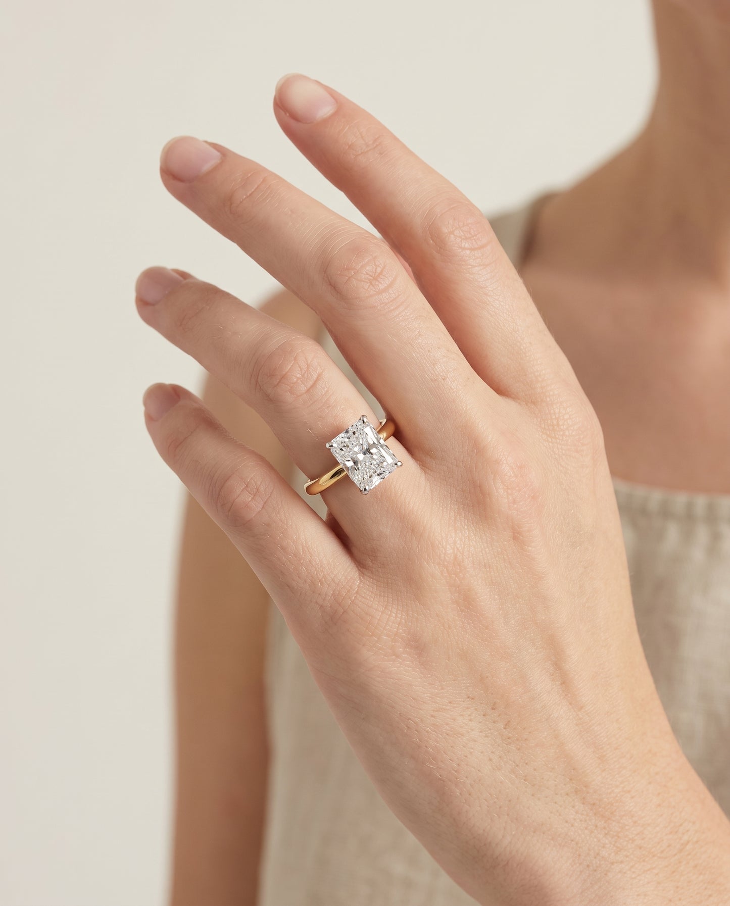 The Isolde Petite Knife Edge Solitaire Radiant Cut Engagement Ring Setting in 18K Yellow Gold