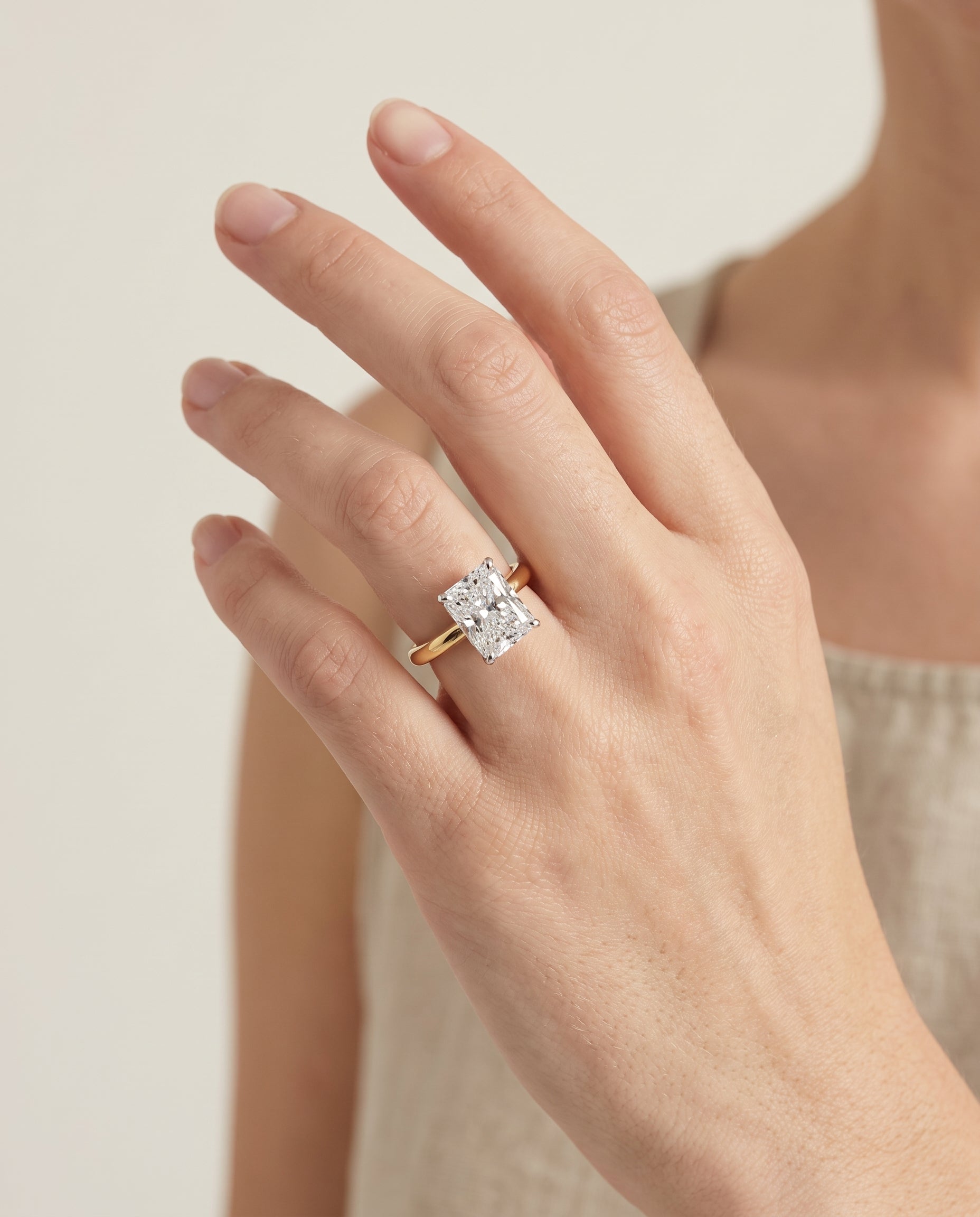 The Isolde engagement ring setting in 18K Yellow Gold, petite knife edge solitaire cut design | RockHer