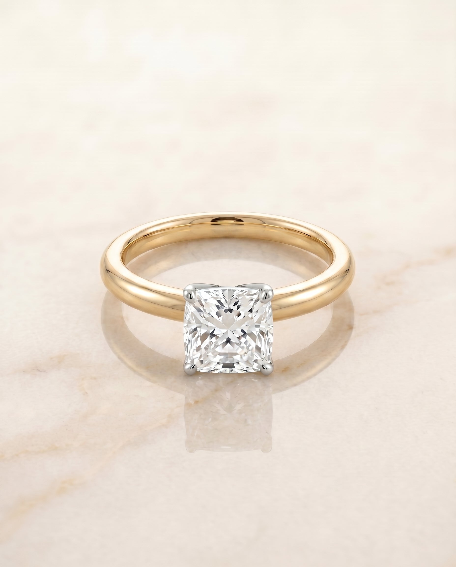 The Isolde Solitaire Engagement Ring Setting for Cushion Diamonds in 18K Yellow Gold