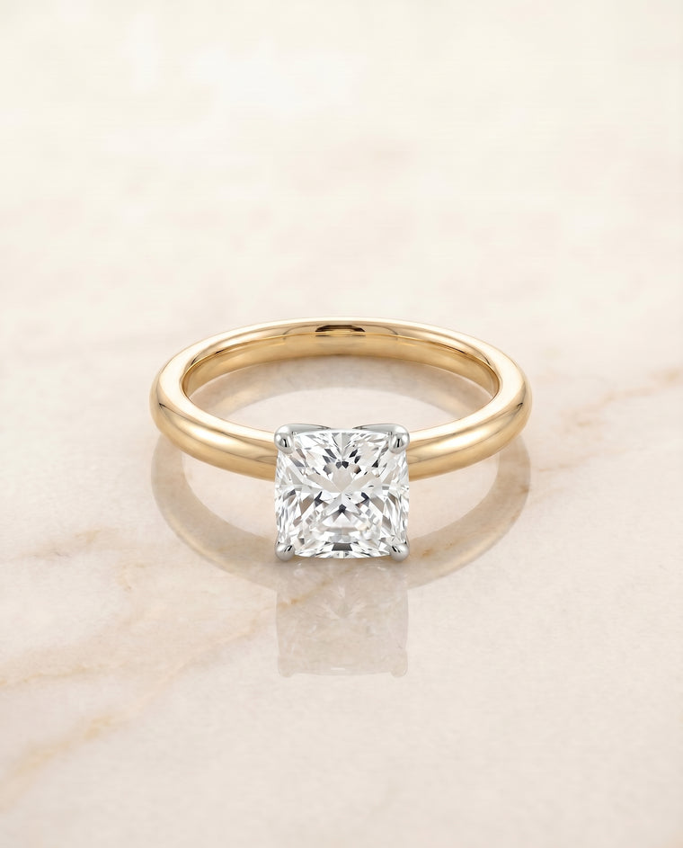 The Isolde Petite Knife Edge Solitaire Cushion Cut Engagement Ring Setting in 18K Yellow Gold