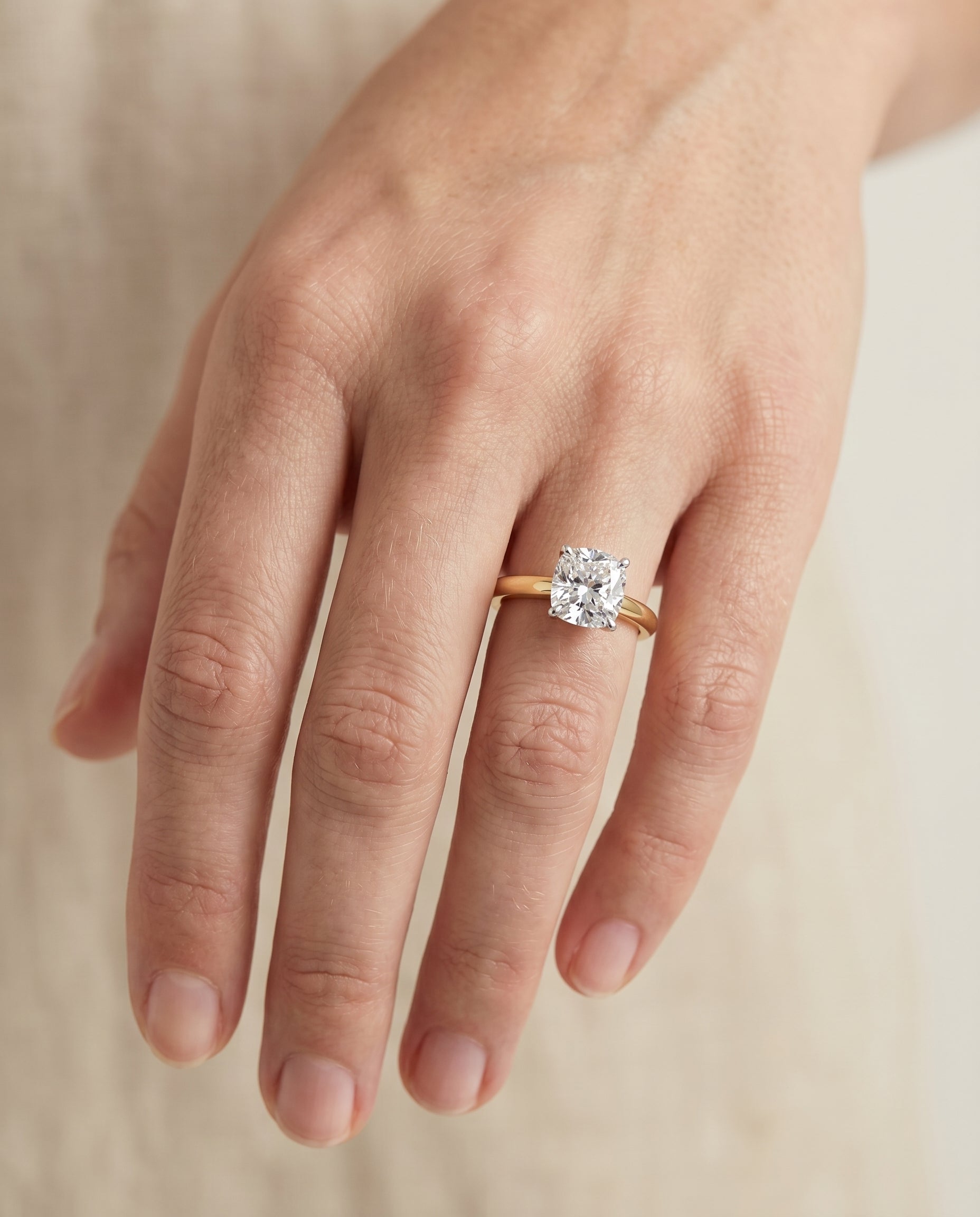 The Isolde engagement ring setting in 18K Yellow Gold, petite knife edge solitaire cut design | RockHer