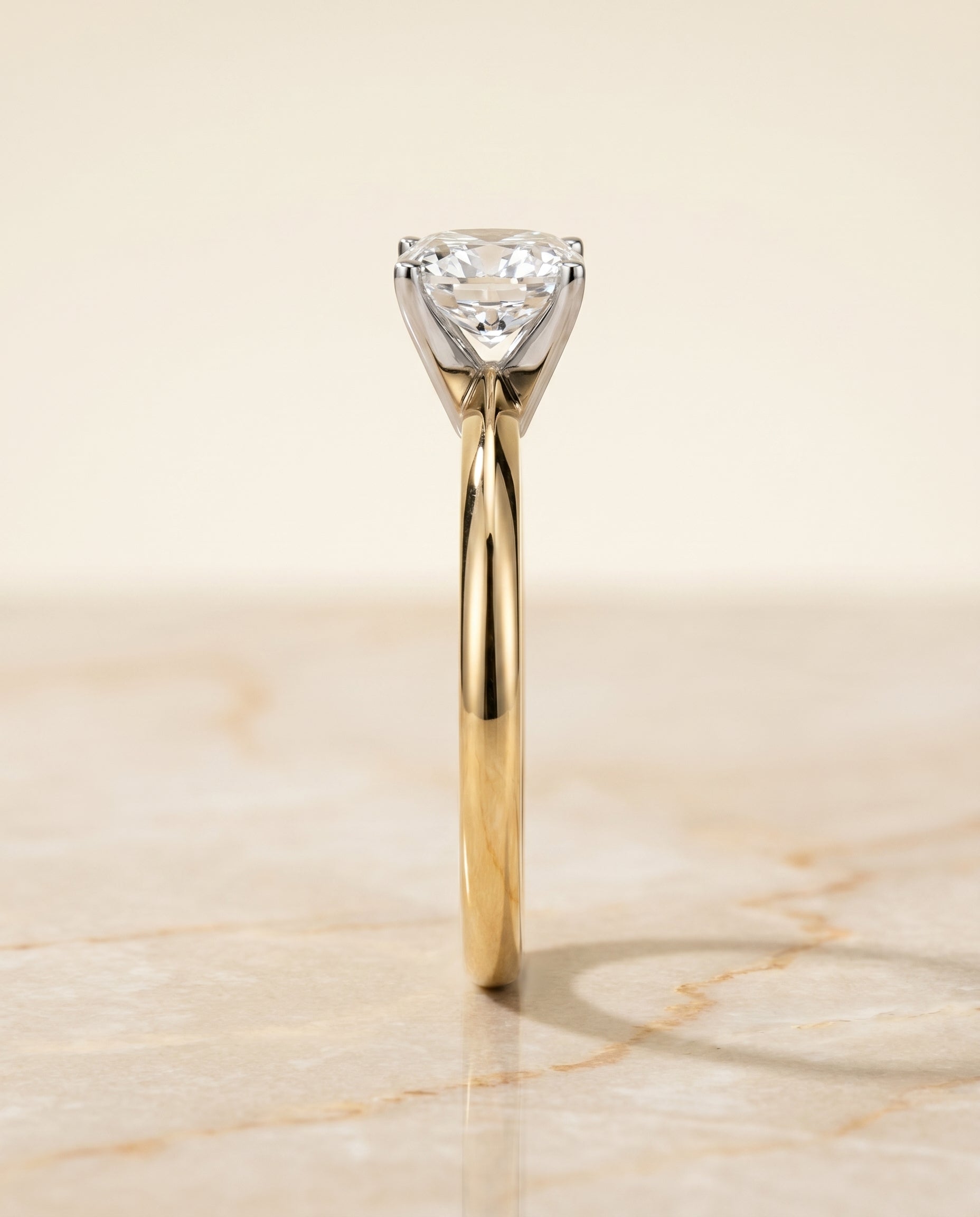 The Isolde setting for cushion diamonds, made to order in 18K Yellow Gold | RockHer