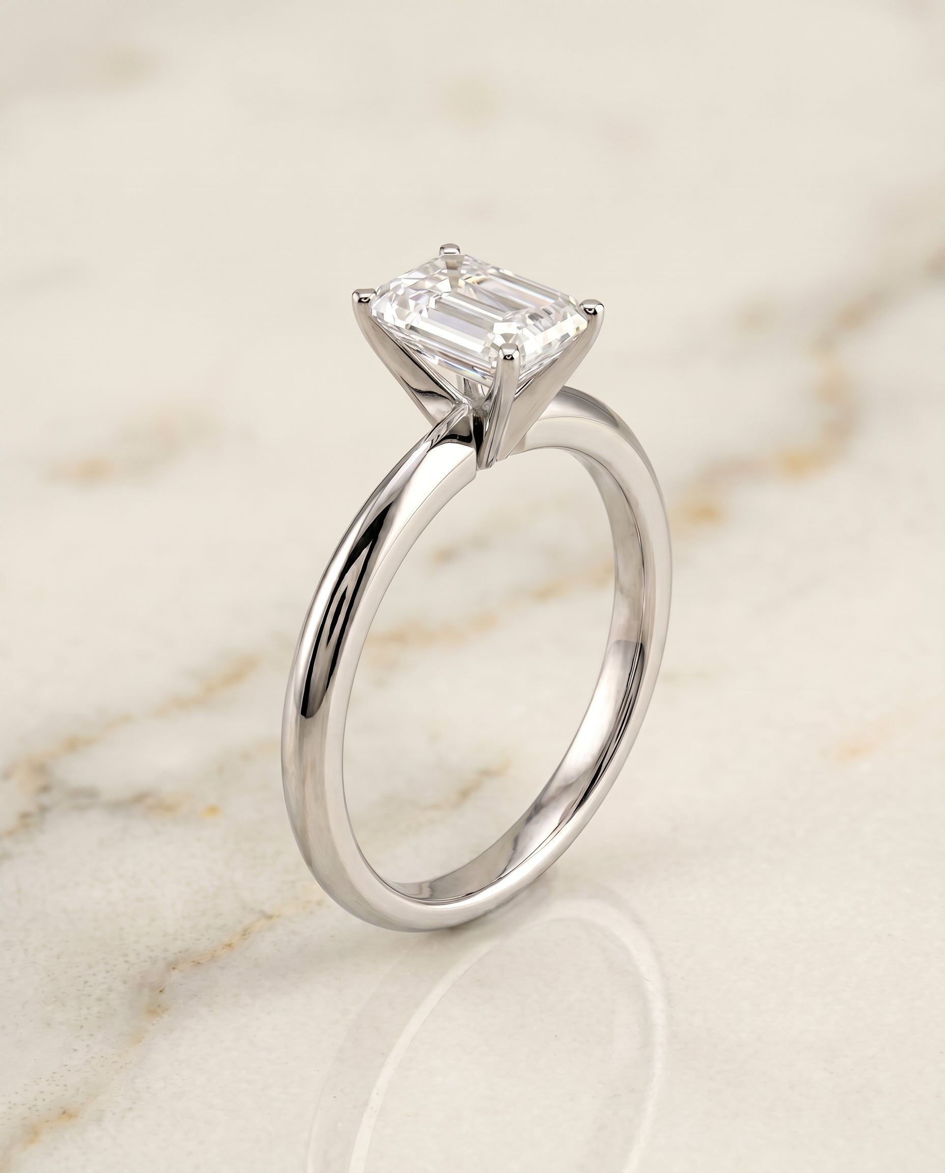 Petite Knife Edge Solitaire Cut styling on The Isolde emerald engagement ring setting | RockHer