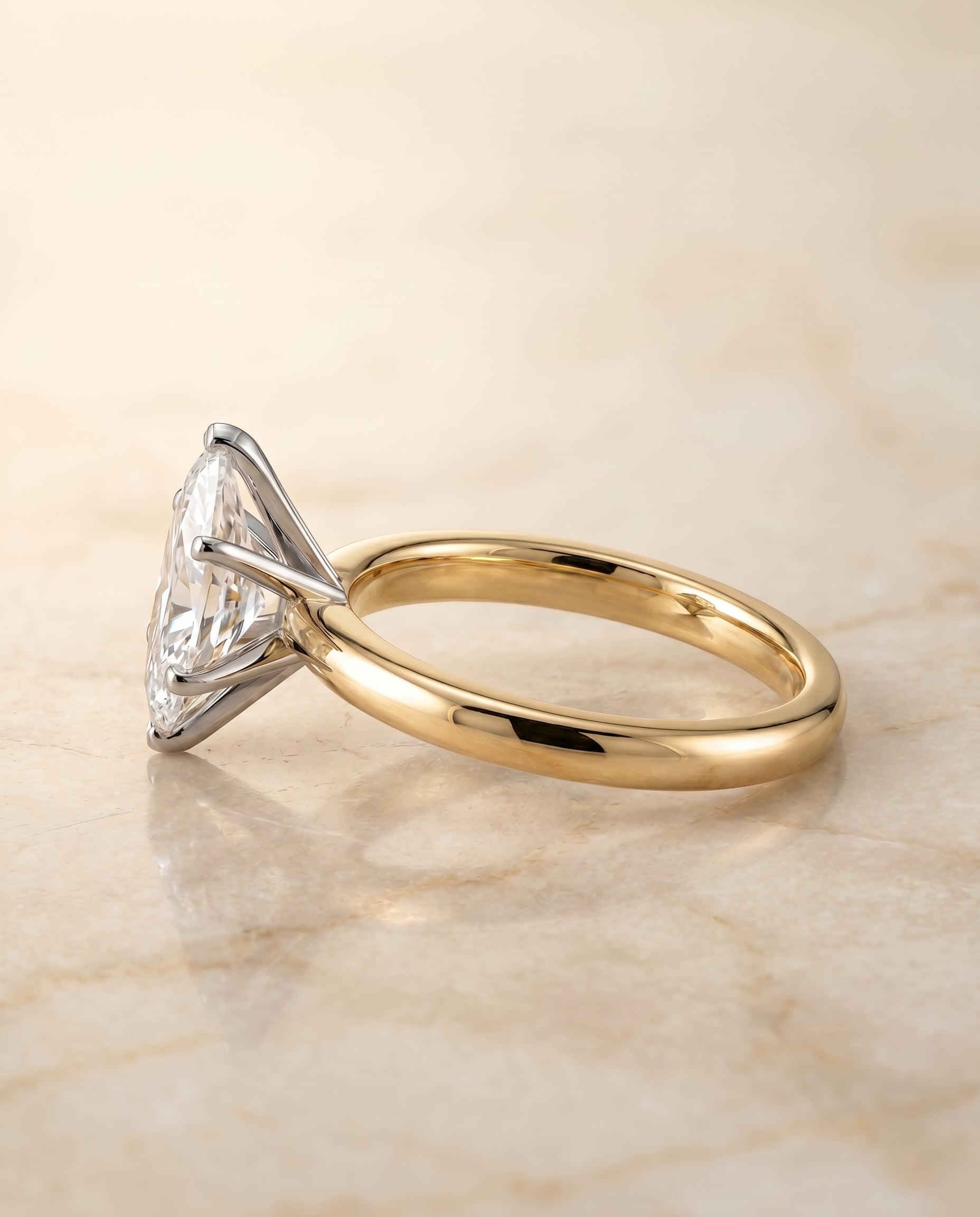 The Isolde setting for marquise diamonds, made to order in 18K Yellow Gold | RockHer