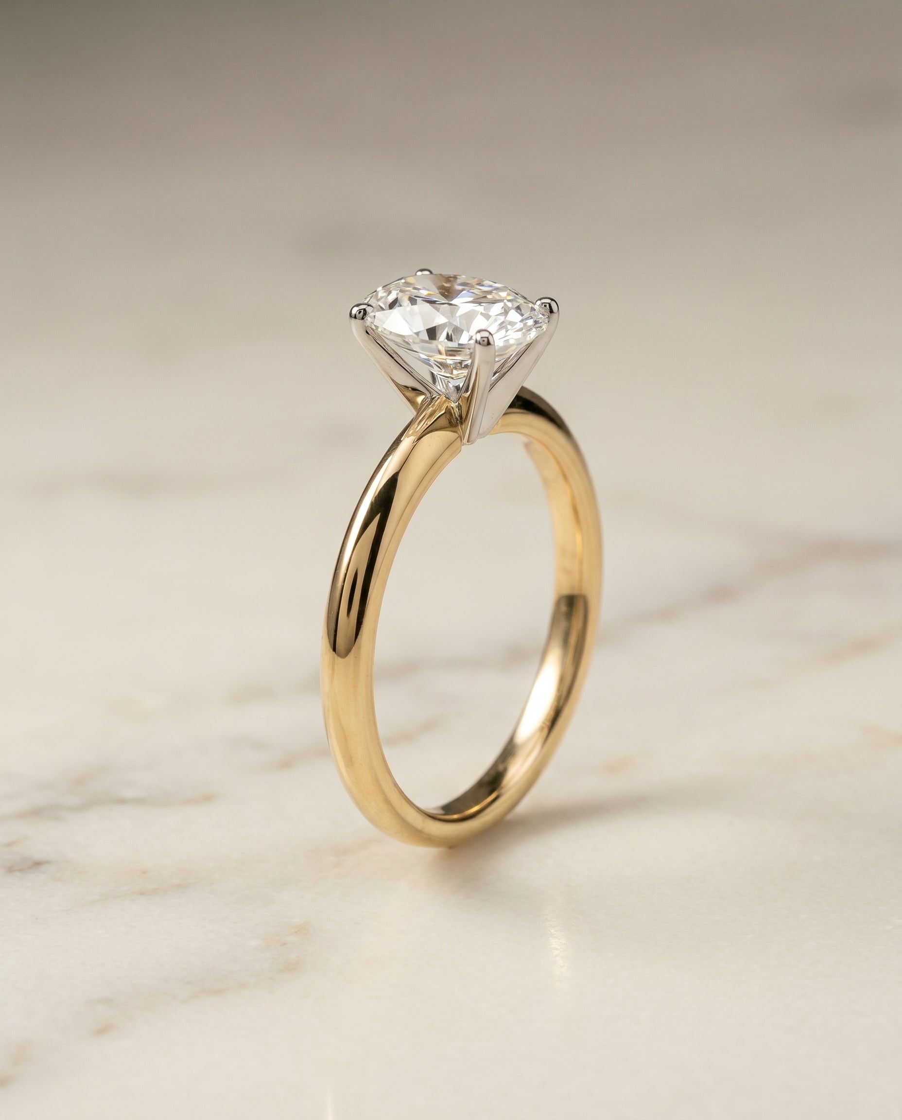 Petite Knife Edge Solitaire styling on The Isolde oval engagement ring setting | RockHer
