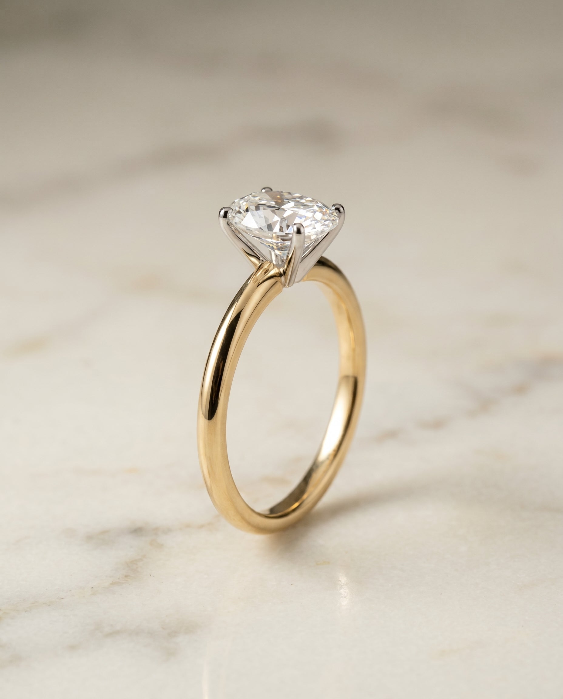 The Isolde setting for oval diamonds, made to order in 18K Yellow Gold | RockHer