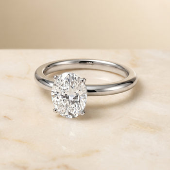 The Isolde Petite Knife Edge Solitaire Oval Engagement Ring Setting in Platinum