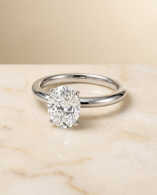The Isolde Solitaire Engagement Ring Setting for Oval Diamonds in Platinum