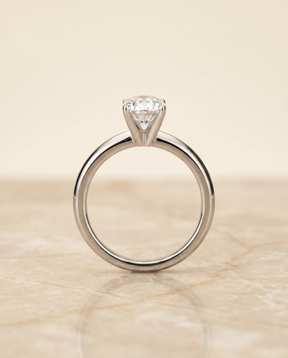 Isolde Select Knife Edge Solitaire Oval Lab Diamond Engagement Ring in Platinum, side view | RockHer