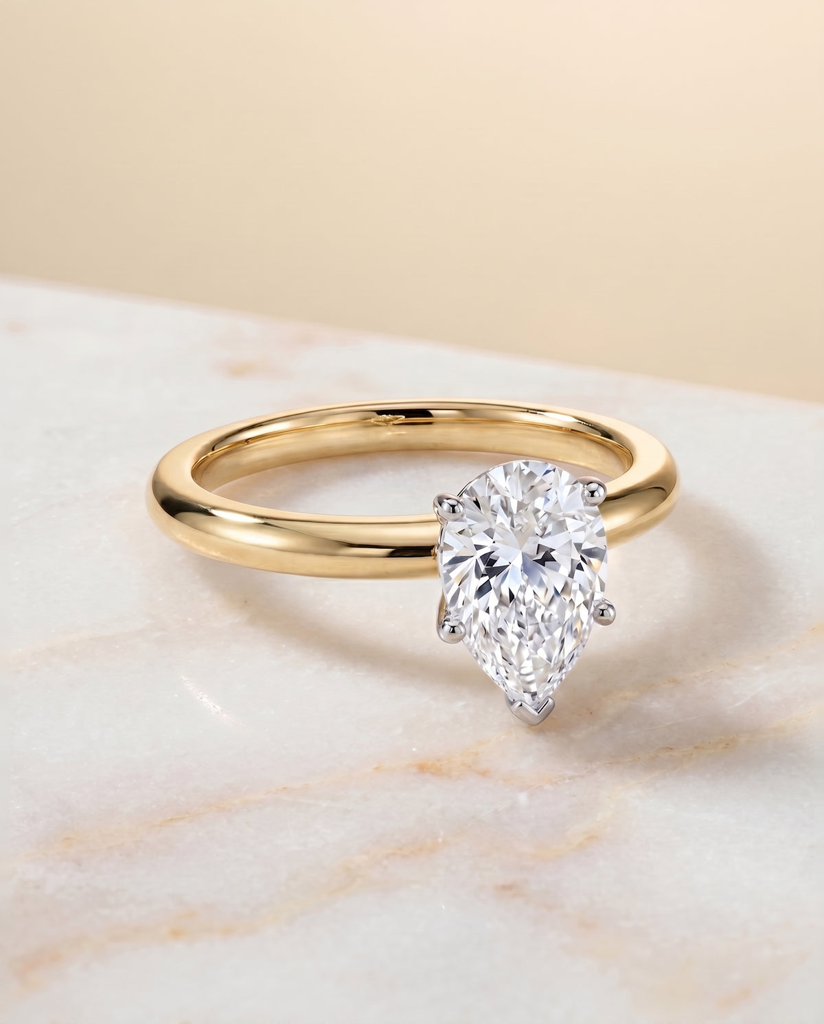 The Isolde pear engagement ring setting in 18K Yellow Gold | RockHer
