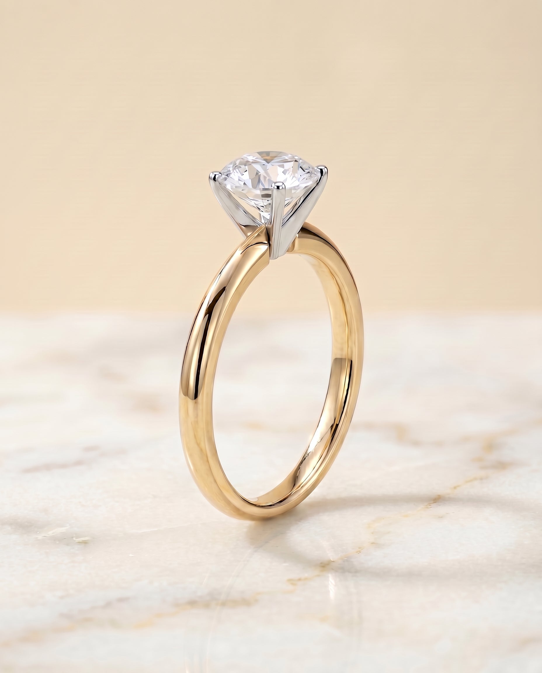 The Isolde setting for round diamonds, made to order in 18K Yellow Gold | RockHer