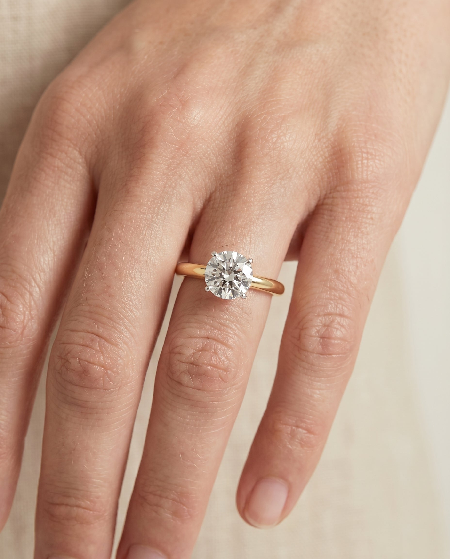 The Isolde engagement ring setting in 18K Yellow Gold, petite knife edge solitaire design | RockHer