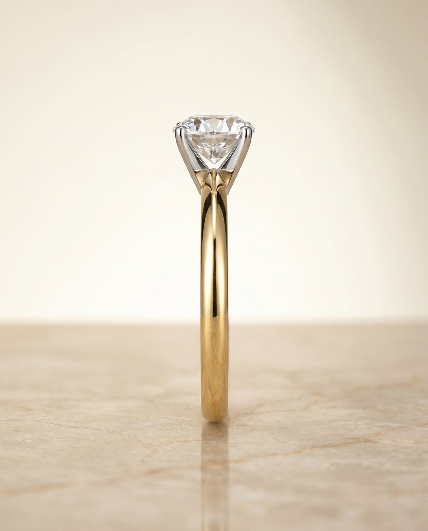 The Isolde Petite Knife Edge Solitaire Round Engagement Ring Setting in 18K Yellow Gold