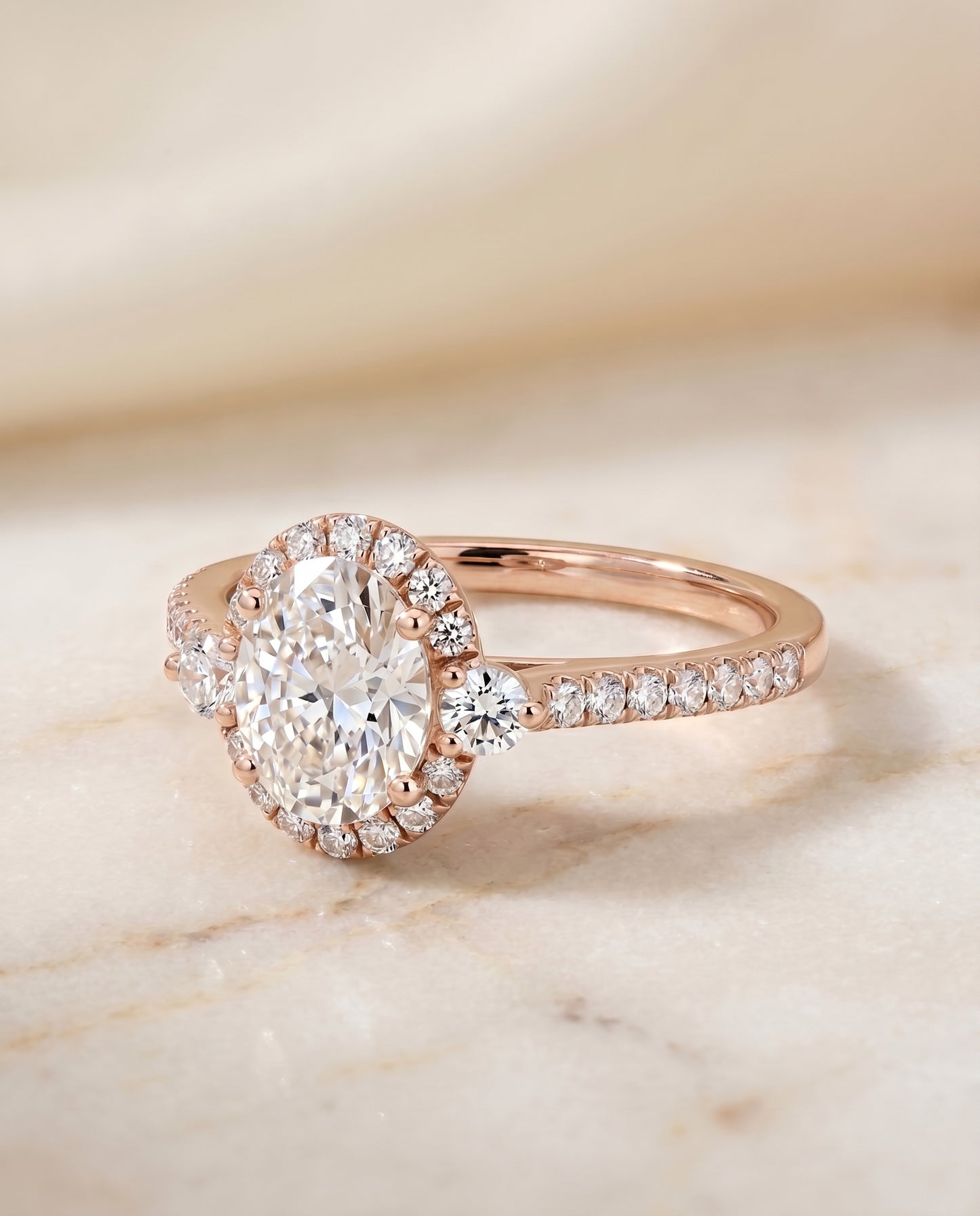 The Ivy Three Stone Delicate Halo Oval Engagement Ring Setting in 14K Rose Gold