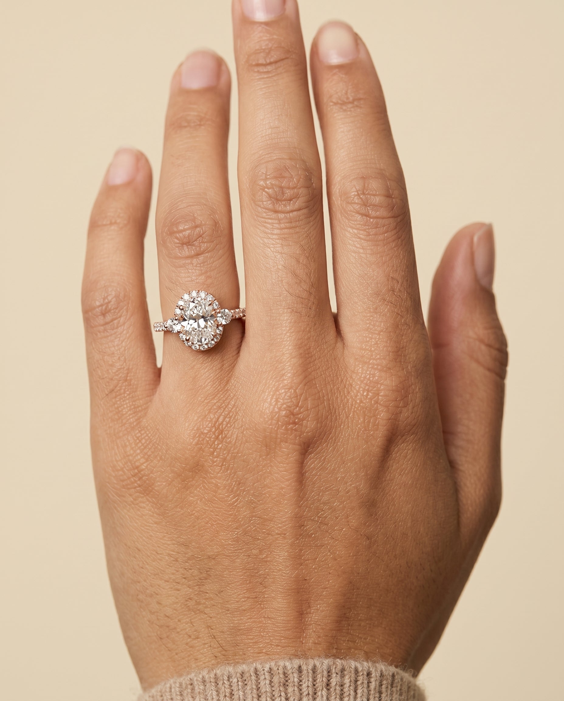 The Ivy engagement ring setting in 14K Rose Gold, three stone delicate halo design | RockHer