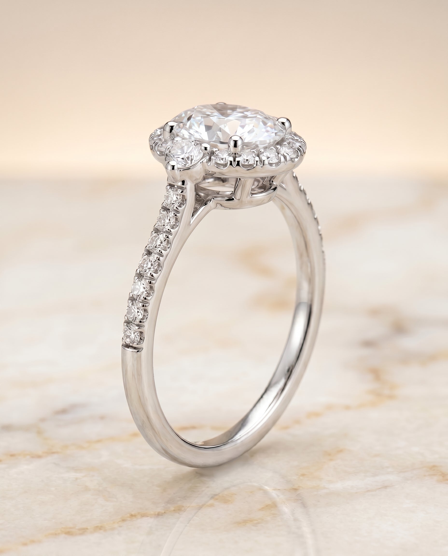 Three Stone Delicate Halo styling on The Ivy oval engagement ring setting | RockHer