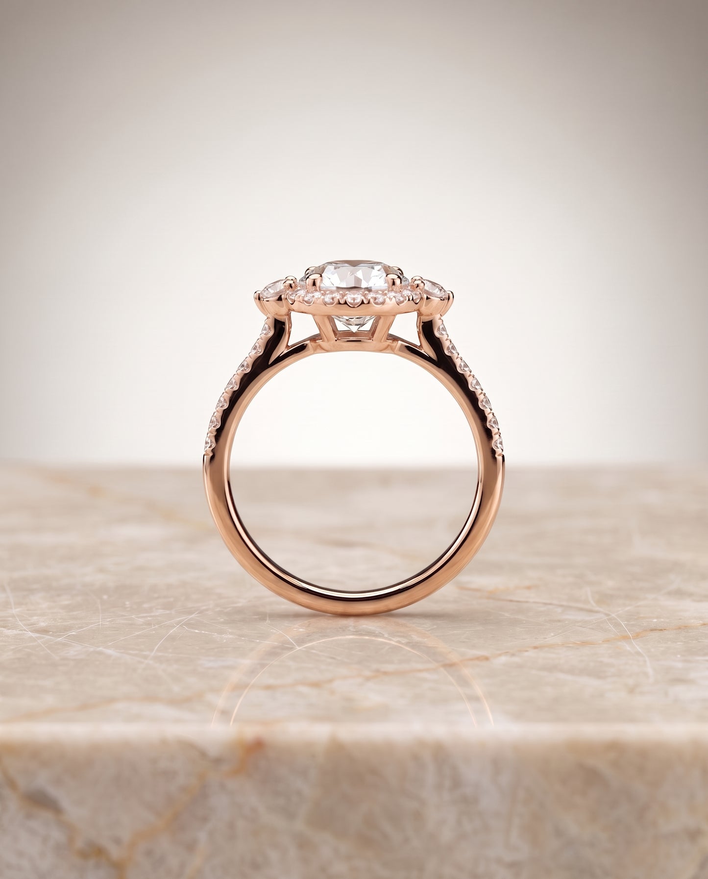 The Ivy Three Stone Delicate Halo Round Engagement Ring Setting in 14K Rose Gold