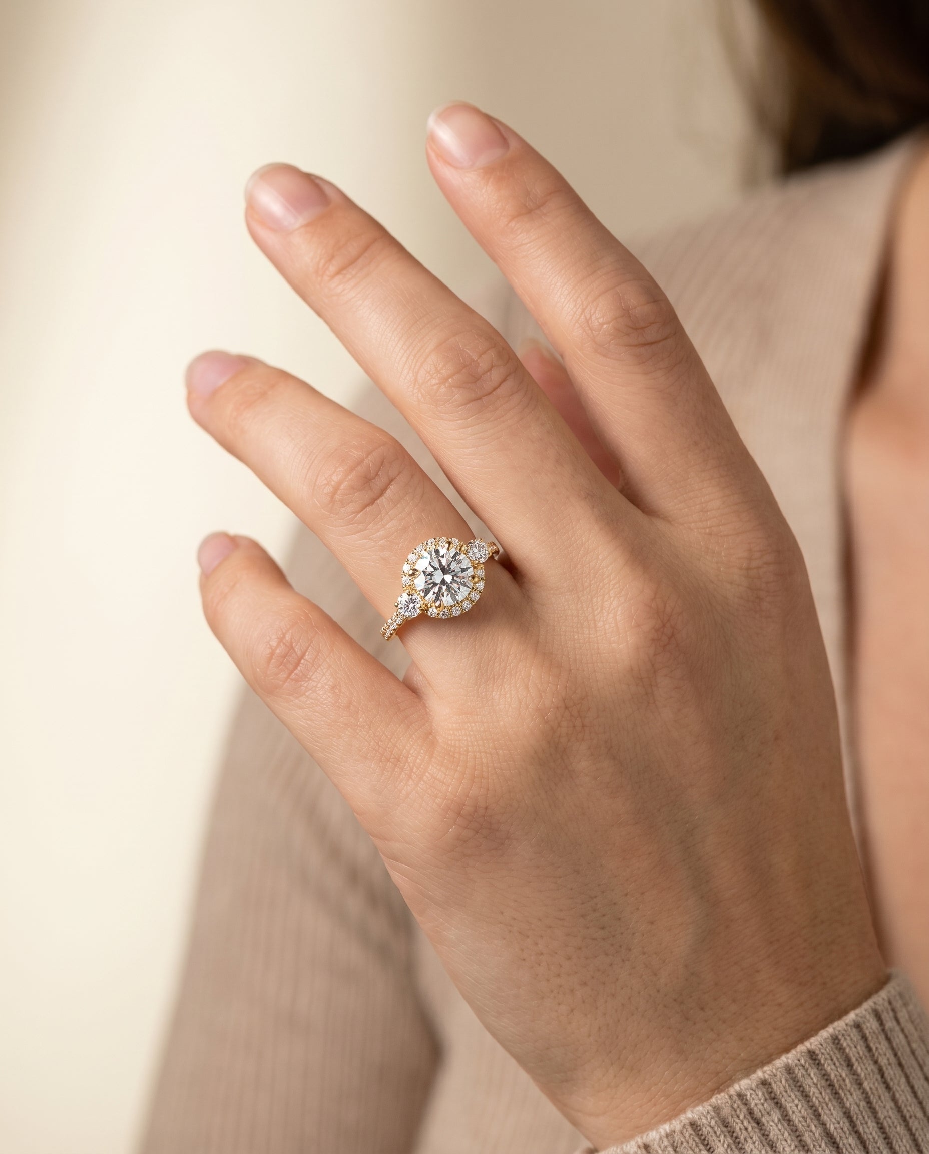 The Ivy engagement ring setting in 18K Yellow Gold, three stone delicate halo design | RockHer