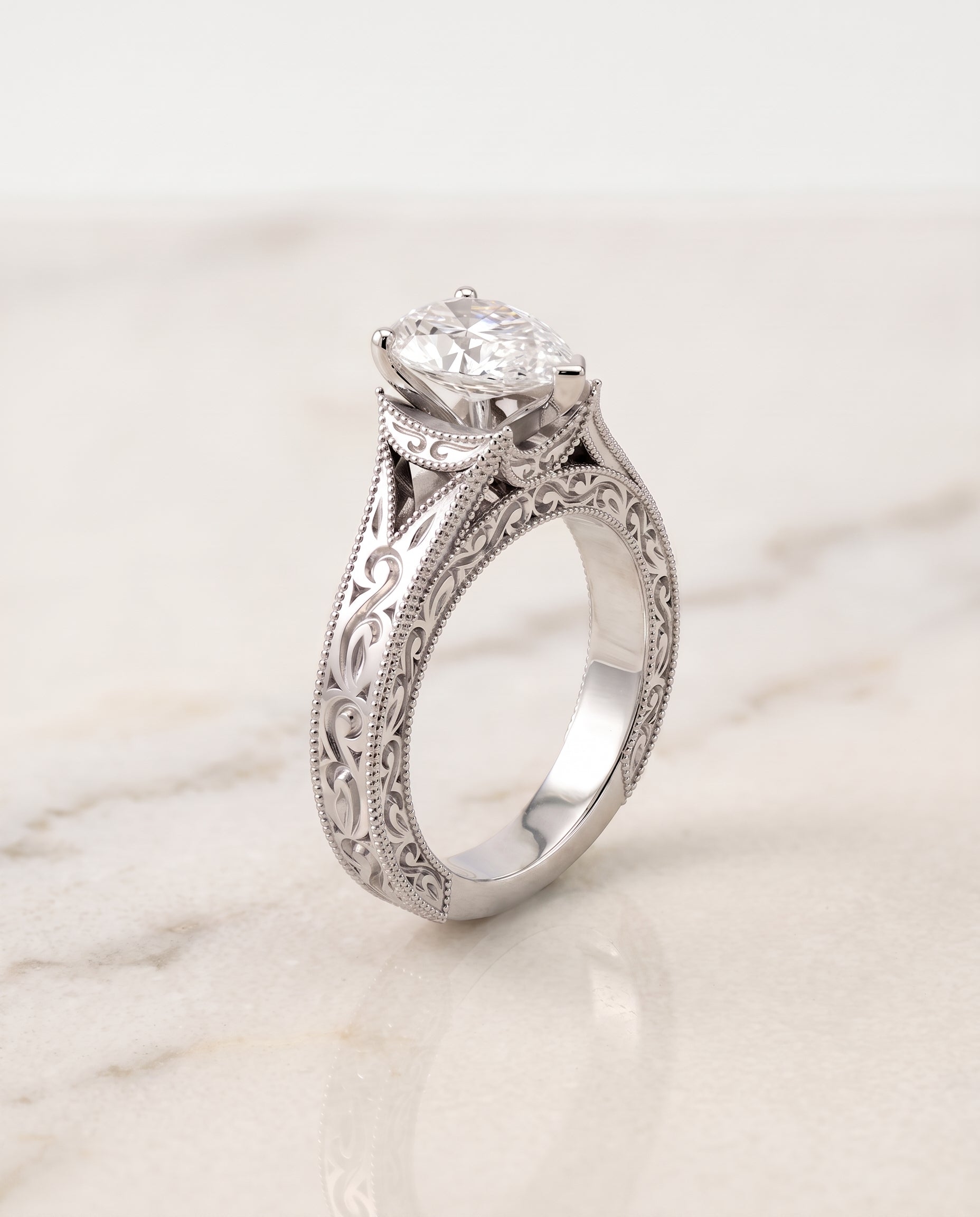 The Janis setting for pear diamonds, made to order in Platinum | RockHer