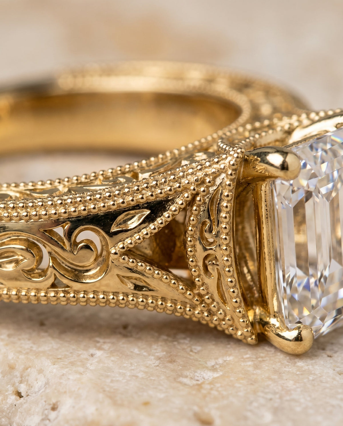 Janis Select Vintage Solitaire Emerald Cut Lab Diamond Engagement Ring in 18K Yellow Gold, detail view | RockHer