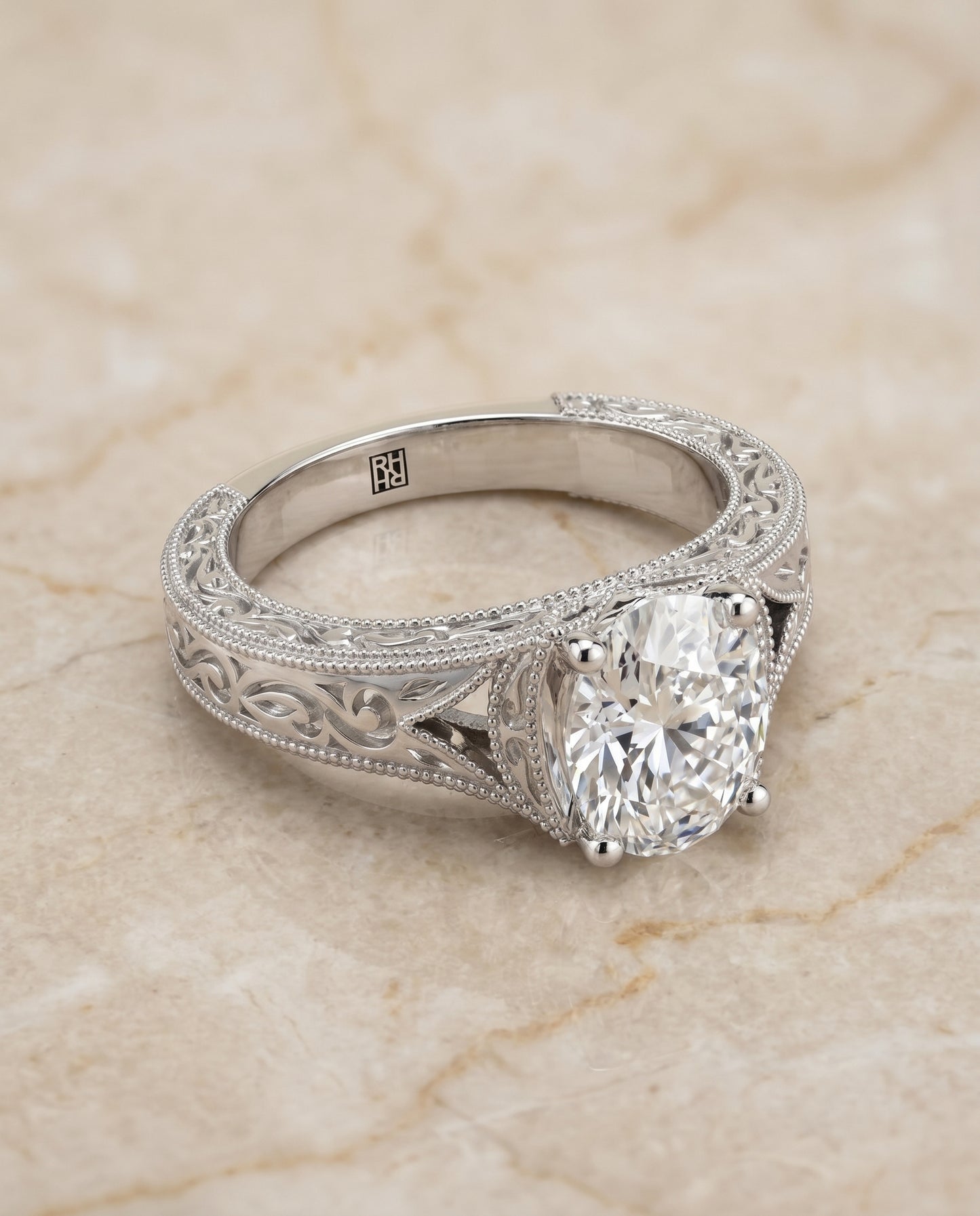 The Janis Solitaire Engagement Ring Setting for Oval Diamonds in 18K White Gold