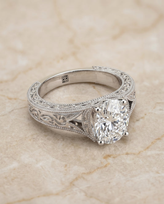 The Janis Solitaire Engagement Ring Setting for Oval Diamonds in 18K White Gold