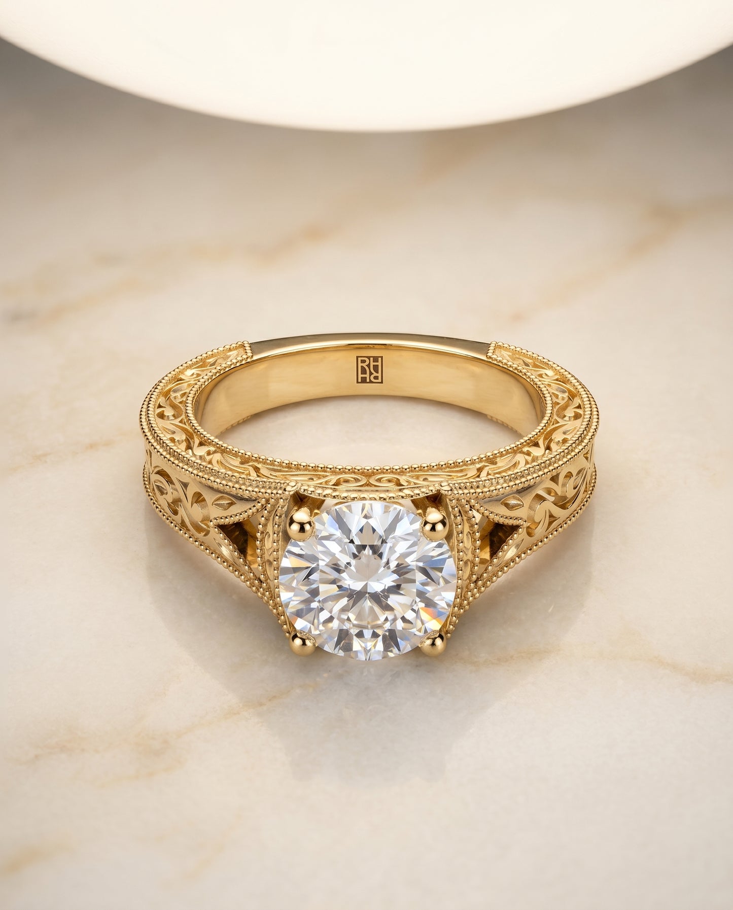 The Janis Solitaire Engagement Ring Setting for Round Diamonds in 18K Yellow Gold