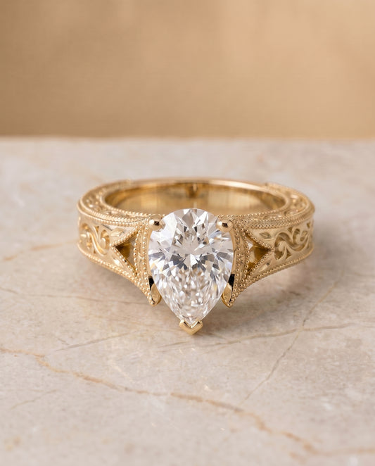 The Janis Vintage Solitaire Engagement Ring Setting for Pear Diamonds in 18K Yellow Gold