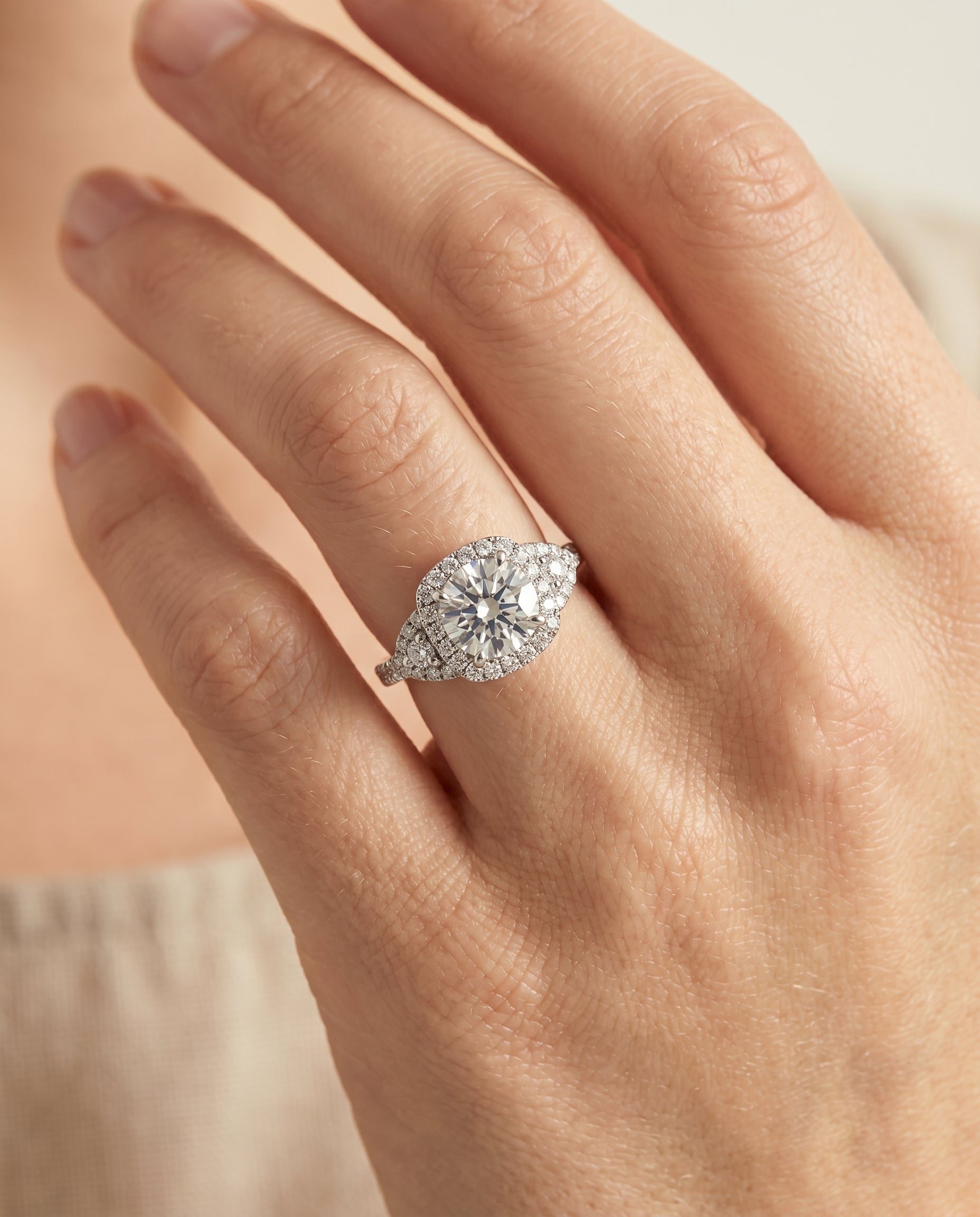 The Jennifer engagement ring setting in Platinum, delicate three stone halo design | RockHer
