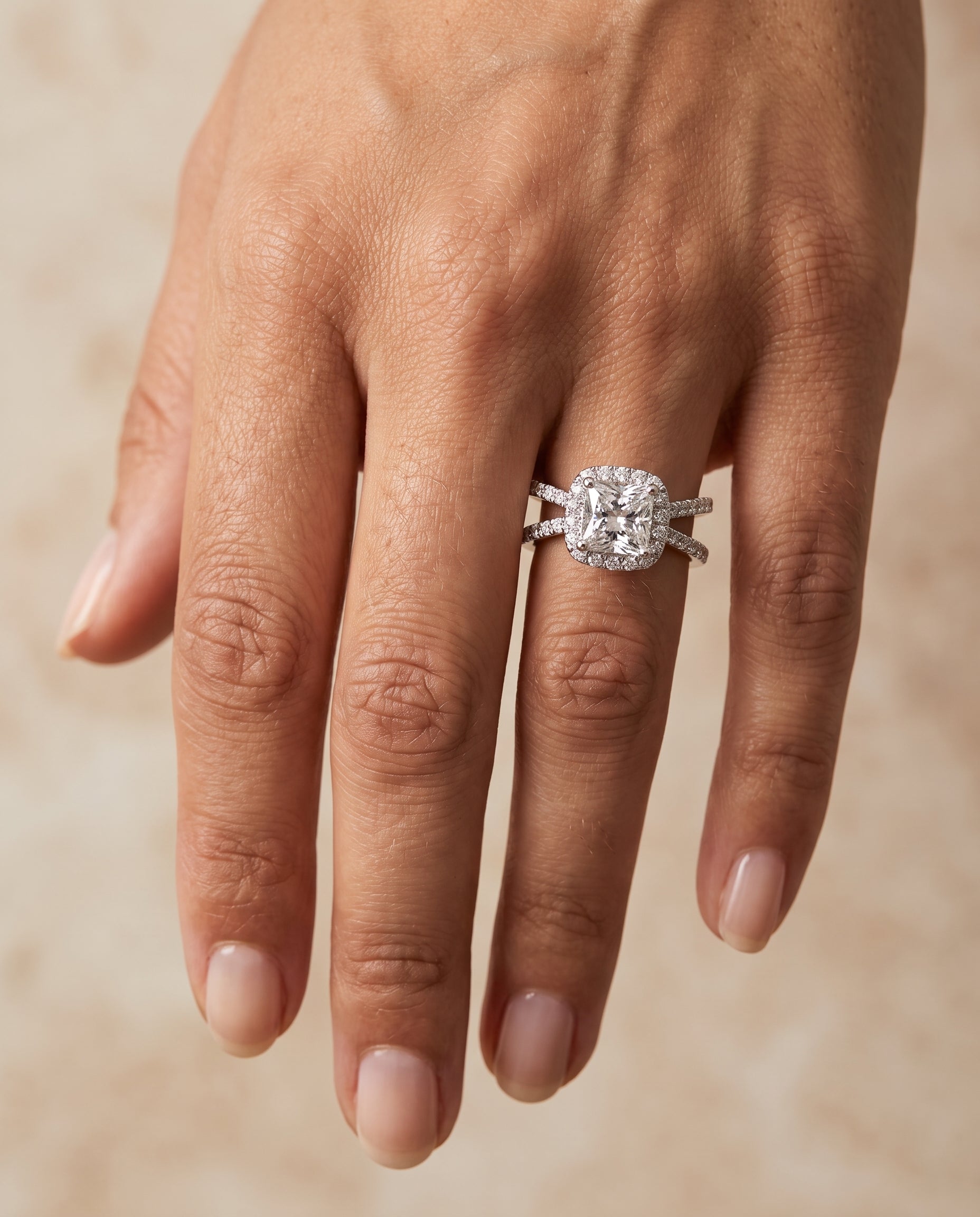 The Joan engagement ring setting in Platinum, crossover pavé halo design | RockHer