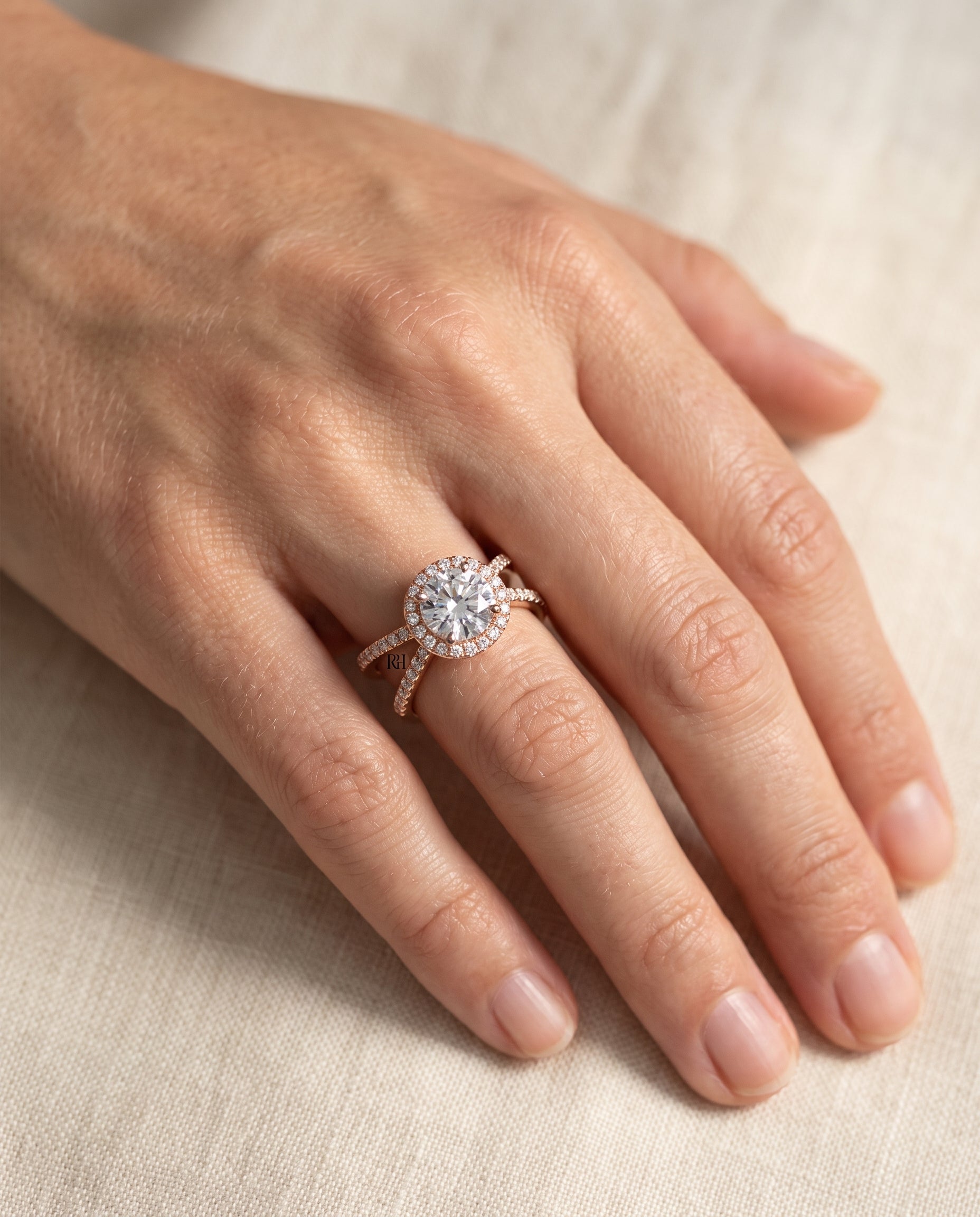 The Joan engagement ring setting in 14K Rose Gold, crossover pavé halo design | RockHer
