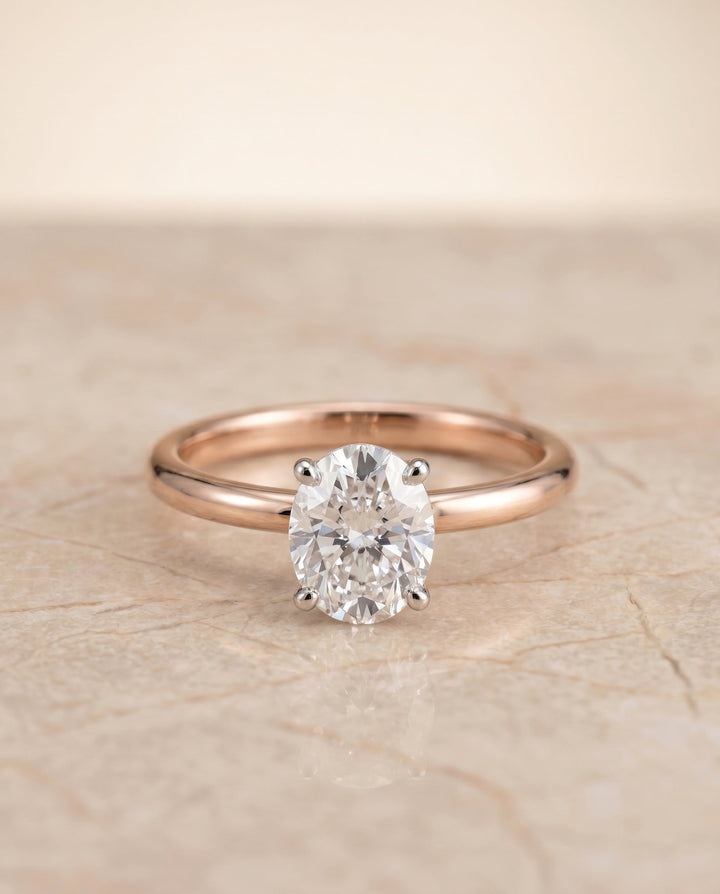 Joni Select Hidden Halo Oval Lab Diamond Engagement Ring in 14K Rose Gold, shown on hand, angled | RockHer