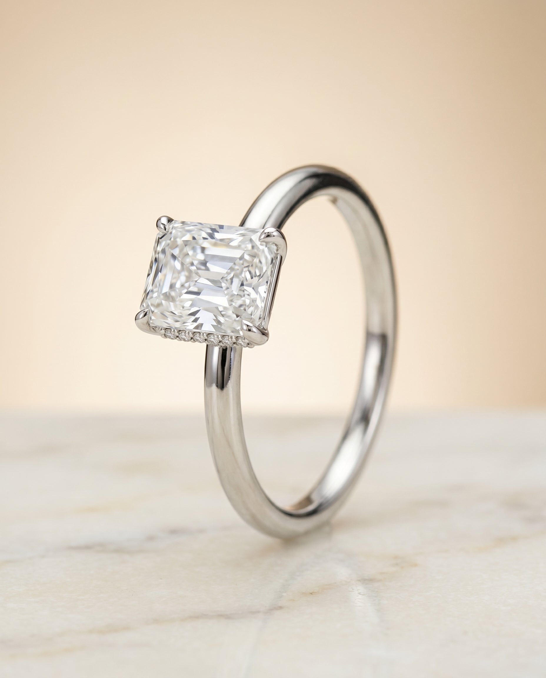 Hidden Halo Solitaire Cut styling on The Joni radiant engagement ring setting | RockHer